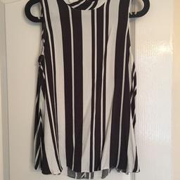 Ladies black and white striped top
Size 10

Excellent condition, from a pet and smoke free home.
Happy to post at the expense of the buyer.