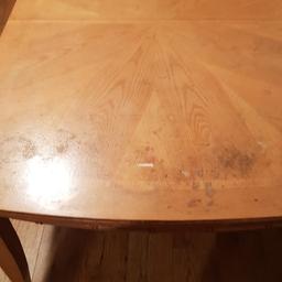 Large solid wood table (extendable) for sale with 4 matching chairs.

Two issues are that the table and 2 chairs are a little wobly. But solid and still very very strong.