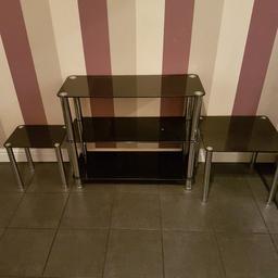 3 tier black glass tv stand and 2 tables. 1 medium size 1 small.
