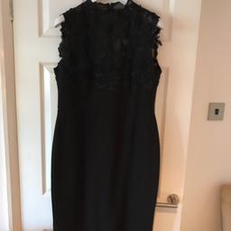 Three quarter length black monsoon evening dress. Beautiful lace detail to the top and back. Worn once lovely condition perfect for Christmas party size16