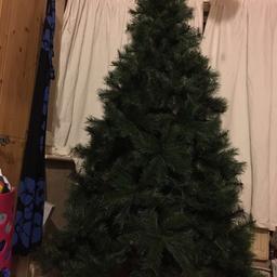 Lovely 7 ft Christmas tree £50 or for a extra £10 you can have all the lights and decorations with the tree