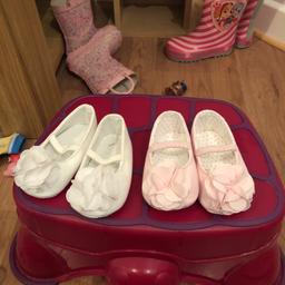 Both 9-12 month baby shoes. One pink one white. Both brand new.