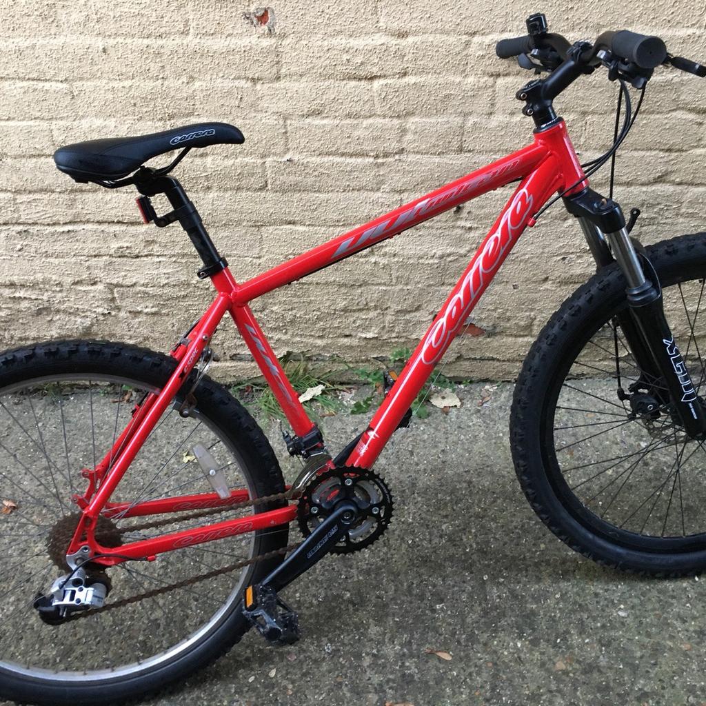 Carrera vulcan store red mountain bike