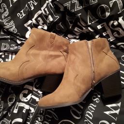 Boots never worn size 8 buyer collects no time wasters