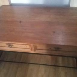 Nice solid coffee table with 2 draws on each side so 4 in tottal