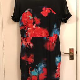 Soft to the touch floral patterned fabric in body of dress, leading up to a sheer chiffon upper bodice and short sleeves.  This is repeated on the back. I accept PayPal and will post out.