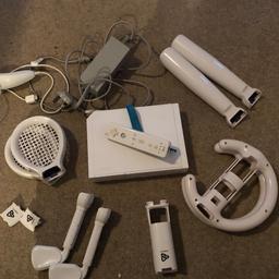 Selling our Nintendo wii!!! It’s in perfect condition and in full working order!! It comes with 10 games, the wii drawing board, wii infinity + 3 figures, and loads of sport game equipment