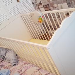 Ikea cot for sale very good condition does come with mattress with protective cover which im currently washing son hardly slept in it prefers my bed lol