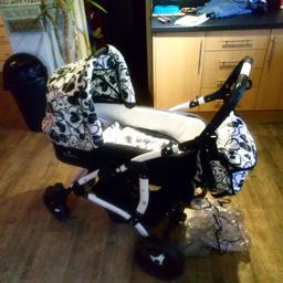 Limited edition Venicci travel system, excellent condition complete with carseat and adaptor, pram and cosy toes, push chair and foot muff, rain cover and changing bag. Only reason for selling as daughter no longer needs it.