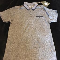 New men’s polo shirt medium size, with tags

In excellent condition as new with tags

From a non smoking and pet free household

Collection from Folkestone or Hythe