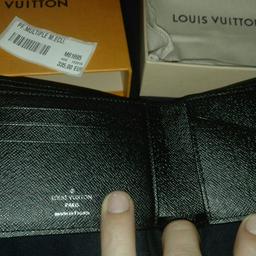 Portafoglio Louis Vuitton nero e grigio nuovo regalo non gradito,senza garanzia