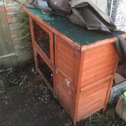 Two tier rabbit hutch in good condition with a cover that has a slight rip in it.  In need of a good clean other than that ideal