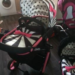Pram fantastic condition comes with carry cot car seat, car seat adapters push chair bit footmuff 2 sets off rain covers. Black and white fur