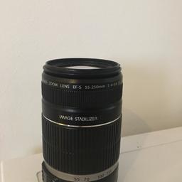 The Canon EF-S 55–250mm f/4–5.6 IS lenses are a series of telephoto zoom lenses for Canon EOS digital single-lens reflex cameras with a Canon EF-S lens mount. No marks or scratches. Comes with front and rear lens covers.