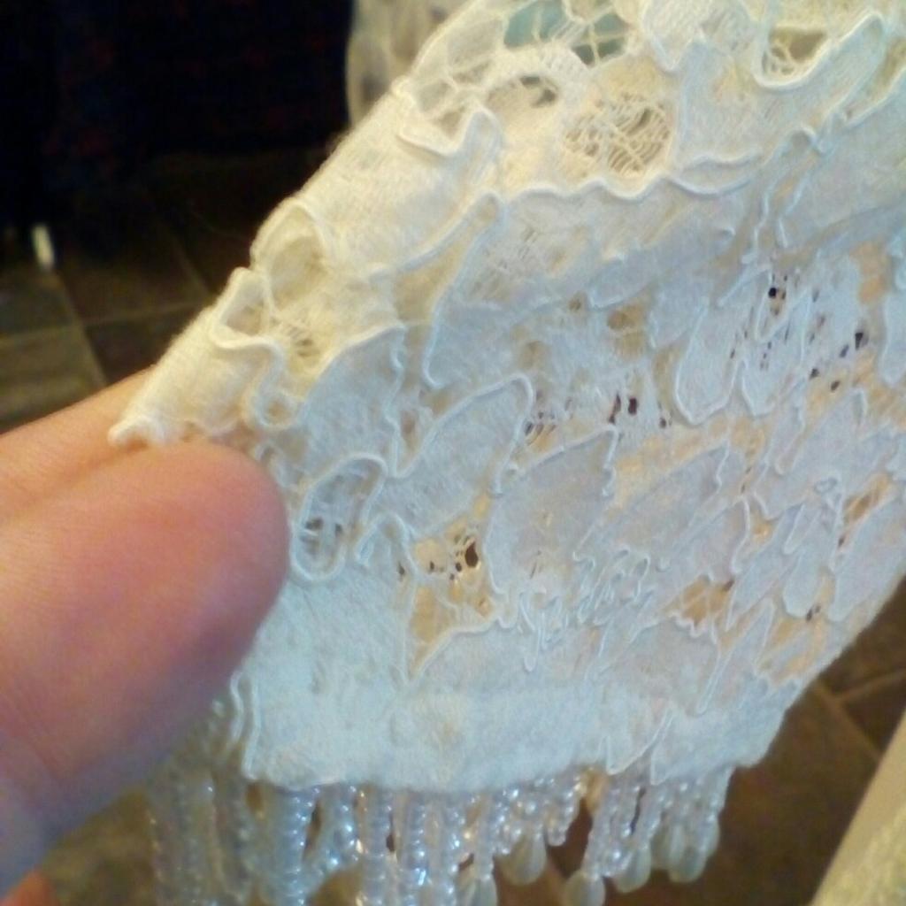 Stunning vintage wedding dress or mother of the bride. Was my nans but she didn't wear it in the end. Size 16. Not sure of the age, but it's been in the family for a long time. Thanks for looking collection only please.
