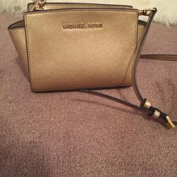 New and used only twice and no marks at all and brought from Westfield shopping centre brought it for £100 gold colour