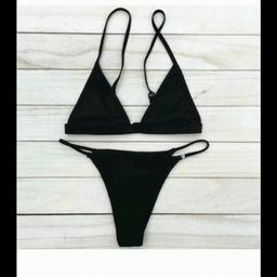 Black bikini size 6-8 never worn only tried on. Stitching has gone on one side but came like this and was too difficult to return