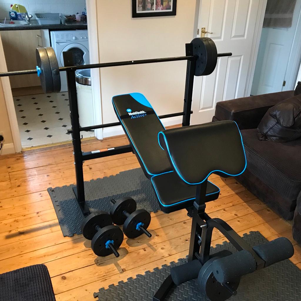 Men's health folding bench & online preacher with 50kg weights exercises