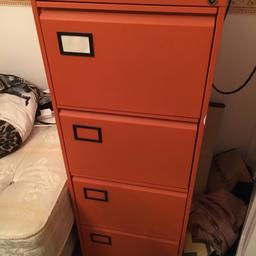 This is a good condition working filling cabinet. No keys!