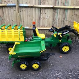 Rolly toys John Deere 7930 pedal tractor with flashing orange light front which was purchased separately

plus front loader

Plus hay wagon trailer which has rear tailgate and tips up

Plus half pipe tipper trailer which has a hinged tailgate

These were all brought New by us, always stored inside and hardly used so are all in very good condition and would make a lovely present