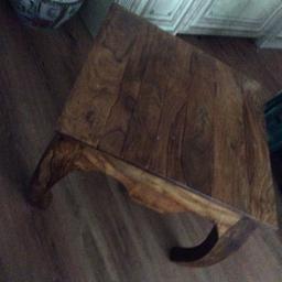 Heavy fruit wood coffee table,heavy,its in good condition ,nice shape,23 wide x23 by 16 inches high