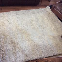 Huge wool ,hard backed shaggy rug made by Fusion, cost a fortune when new ,never hardly been used as to big for room,its cream coloured