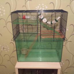 Hamster and gerbil cage in vgc comes with bottle food bowl and toys.