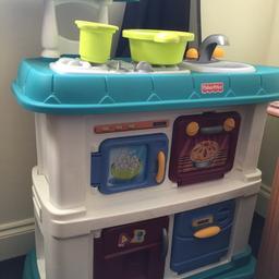 Toddler kitchen.....makes sounds for pan boiling and water running and a timer!!my child too big for this now but lovely first little kitchen