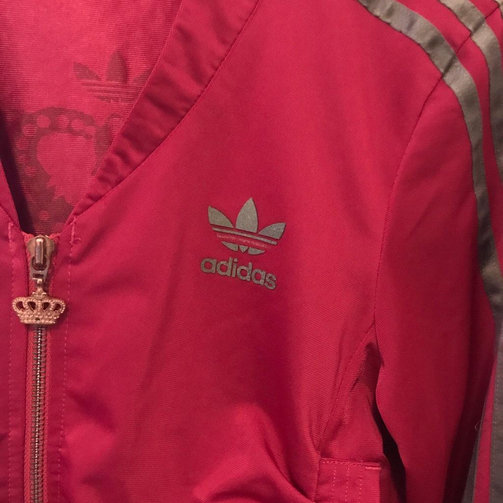 Tuta adidas store fucsia