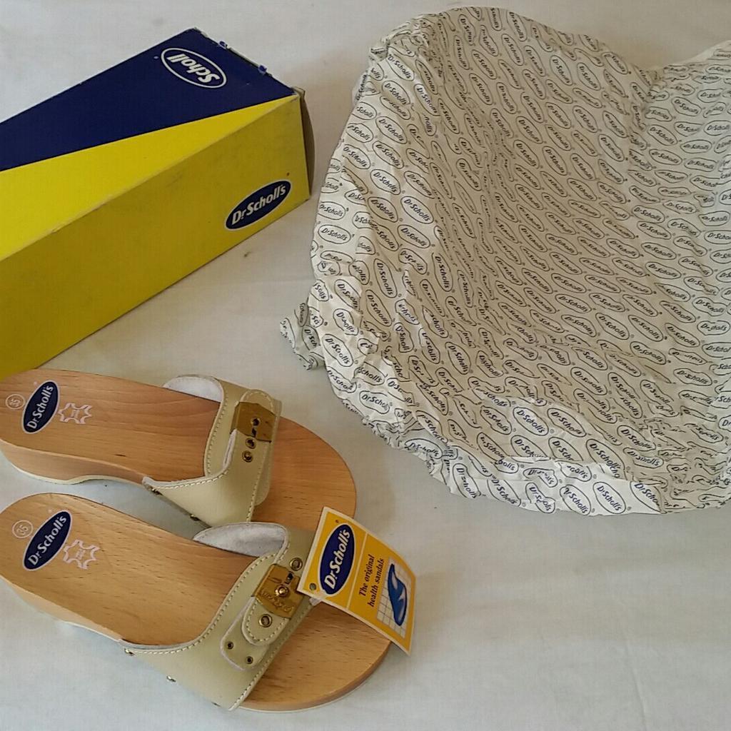 Dr scholl zoccoli hot sale con tacco