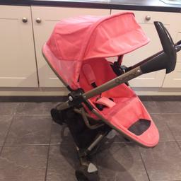 Pink quinny zapp. Few marks to frame and seat from getting in and out car but still pretty good condition. World and parent facing. Lightweight and folds very compact. Comes with raincover. Collection b44