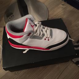 Almost New. Warn twice, good condition white, red, grey and black original Jordan trainers. Trainers come with original box. Purchased in America.