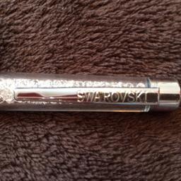 Swarovski Pen, only tried it once, works perfectly, has some tiny scratches on it but it doesn't affect it working.