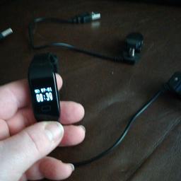 Fitness tracker watch with two chargers, one for home one for car?