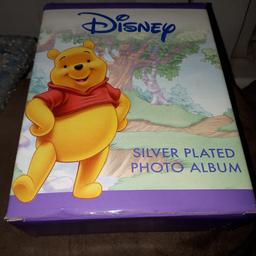 Winnie the Pooh photo album. Never used. Only take photo.