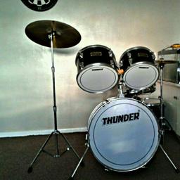 Drum kit parts for sale, no base drum.

Snare drum, high tom, low tom, hi hat and crash.

Also 1 pairs of drum sticks.