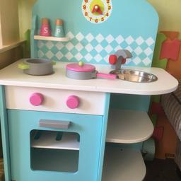 Small wooden play kitchen well used and well played with plenty of life left in it. No plastic window in oven door as this was removed as it was broken and didn’t want toddler to hurt them self on it other than that on minor scratches and marks, it is about 75cms in height. Buyer to collect please