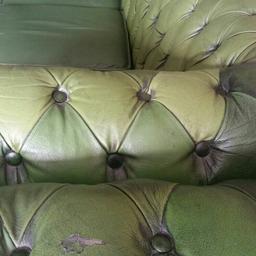 Green real leather  chesterfield 3 seat sofa and chair .....small tear on side as on photo....still looking very nice and well presented £320 ono...no silly offers