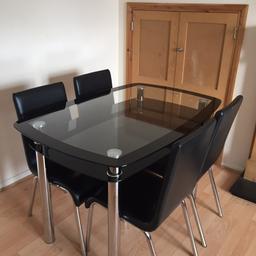 Black table set with 4 chairs
Price negotiable
Almost brand new