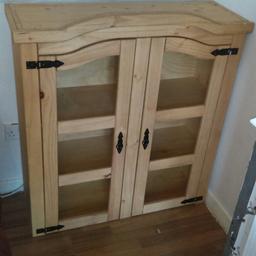 Lovely wood cabinet only reluctantly selling due to down sizing . 41inches wide 14inches front to back 45inches floor to highest point on arch.