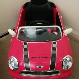 Pink mini cooper only 8 months old and mainly used indoors. Can be used as a push along with foot tray inside. Or tray and handle can be removed to become a ride on. Paid £100 looking for £40