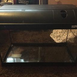 Very good size fish tank for sale comes with light as well