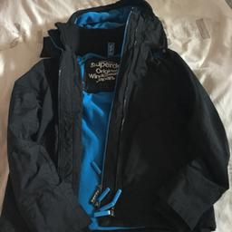 Almost new medium superdry coat. Very heavy an warm