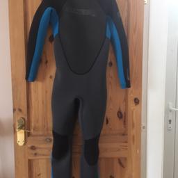 O'Neill boys wetsuit in black and blue, size 14, suitable for approx ages 9 to 12. Immaculate condition as only worn twice. 

Perfect for outdoor swimming in the uk and on holiday.

Buyer to collect.
