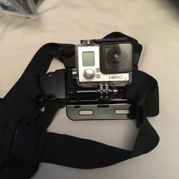 This go pro hero 3 works perfectly however needs a new memory card which is only gonna cost about £10. It comes with 2 j hooks multiple other attachments (see from photos) a head mount two chest mounts a water proof case and lots more as well as a carry case