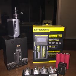 2 weeks old, black with dark grey. No marks whatsoever on it. Comes with 3x LG 18650 cells bought at the same time. 4x genuine brand new coils. 1x spare glass boxed. Very light use and a nitecore 2 bay intellicharger. Pristine condition.