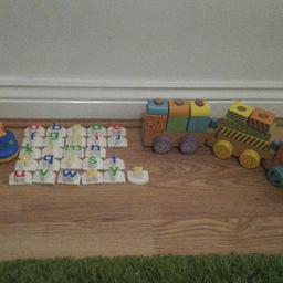 Leap frog alphabet 
Sings and makes sounds 
Letter o is missing but we're still looking 😁

Wooden train