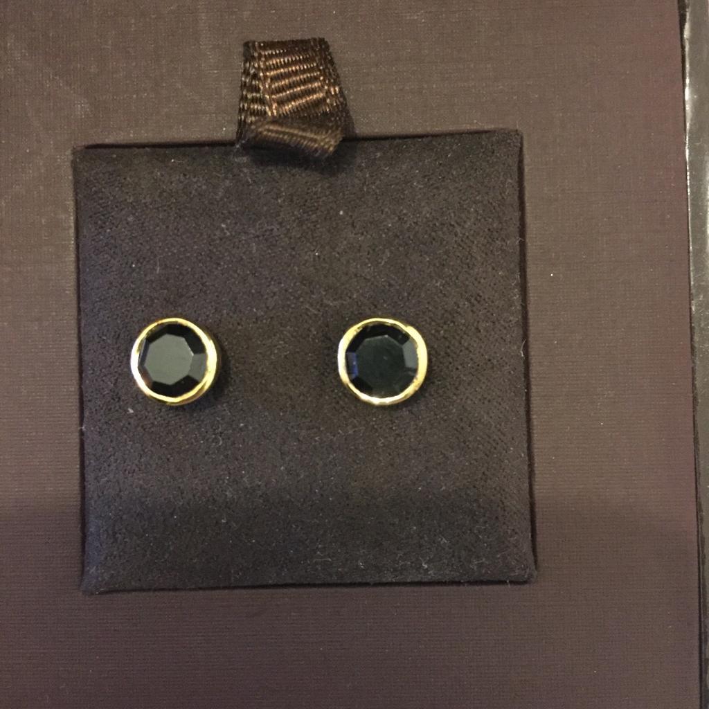 Not been worn, unwanted birthday gift. Gold and black studs.
