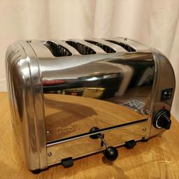 Used Dualit Classic 4 slots toaster (with 2 wide slots) in good working order and fair looking condition.

BRAND NEW heating elements (all) and timer fitted for extra peace of mind. There are few imperfection on the metal see pictures for details.

You can select the number of slots to heat up as you wish.

These toaster are built in UK and designed to be serviceable and this one is in good working order!

Can post within UK will cost £10 typically.

Thank you for looking.