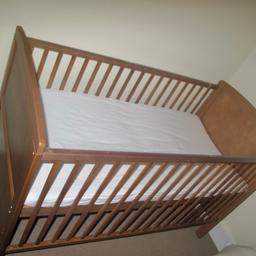 Cot bed great condition only been used for a month. Mattress and matching changing unit included. No scratches or marks on the bed.